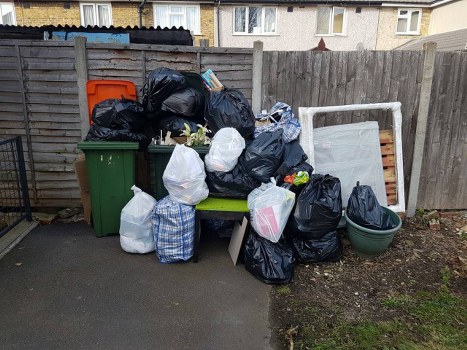 Office clearance crew sorting recyclable materials in Gunnersbury