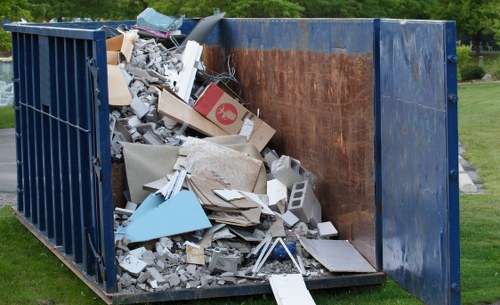 Professional house clearance team at work in a Gunnersbury home